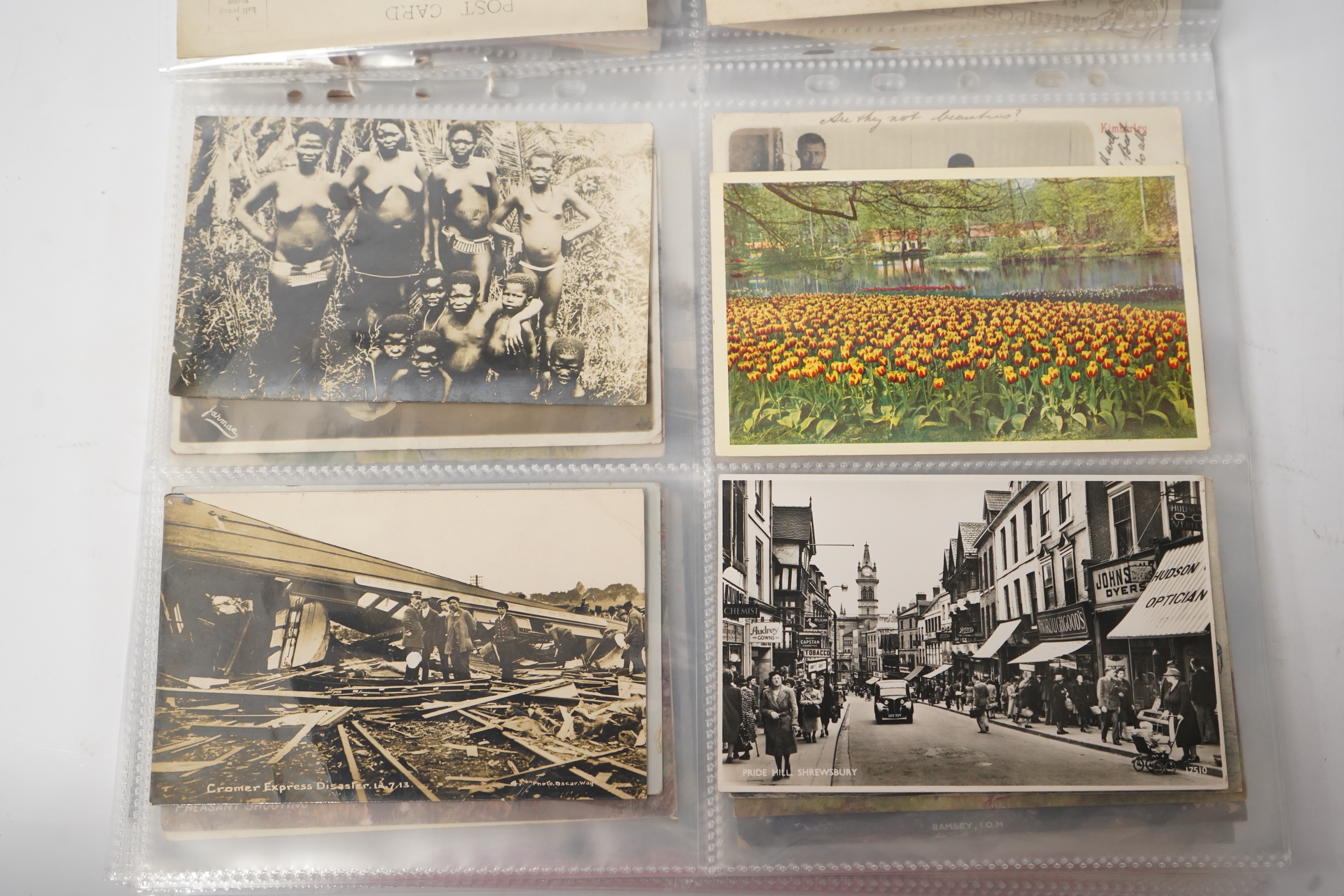 A group of eighty eight assorted vintage postcards, including American topography, rail accidents and motoring.